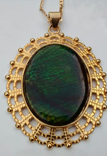 Load image into Gallery viewer, Oval Shaped Green Colored Ammolite in a Gold Colored Setting Necklace
