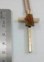 Load image into Gallery viewer, Size of gold colored cross with ammolite stone
