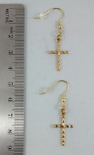 Load image into Gallery viewer, Size of Gold colored Cross Pierced earrings
